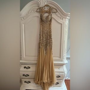 Gold sequins prom dress in fair condition .